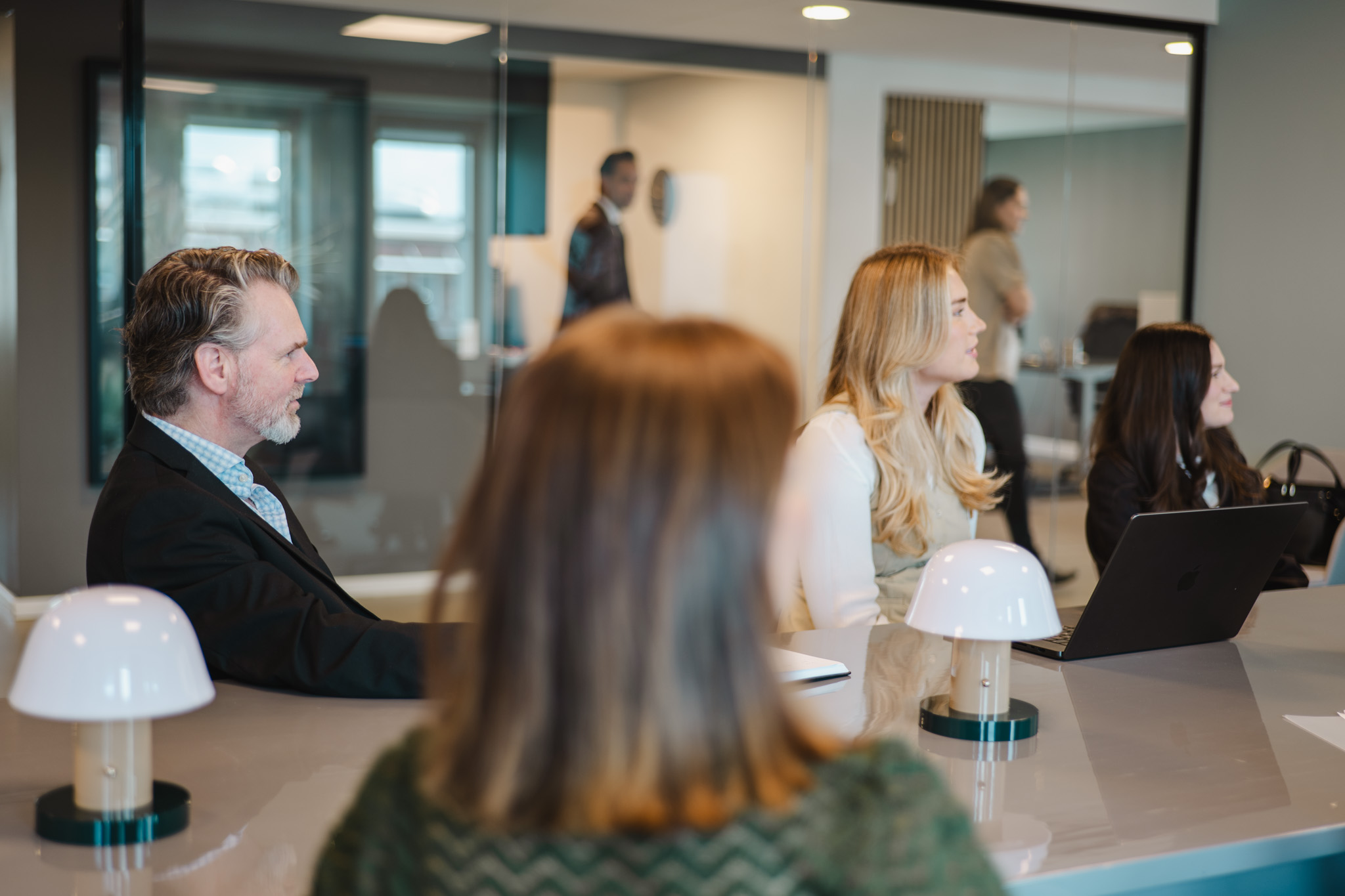Consultants listening during a meeting